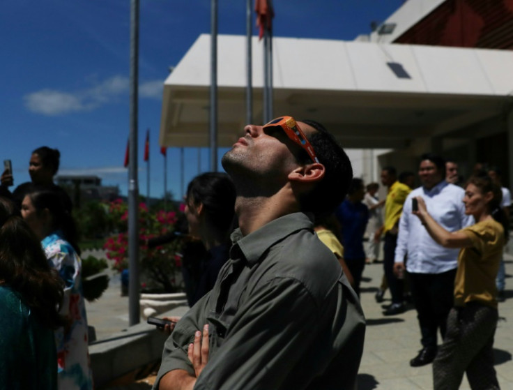 Stargazers in Dili, East Timor, during the eclipse
