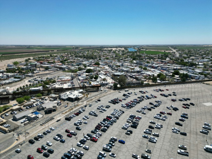 A massive parking lot sits on the US side of the border near Algodones, Mexico