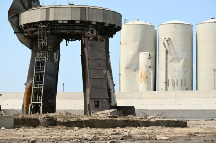 This photo from April 22, 2023 shows damage to the area around the launch pad in Texas of SpaceX's huge Starship rocket; a test launch ended with the rocket's destruction