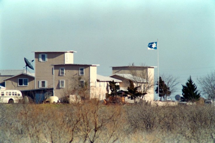 A cult flag flies over the Branch Davidian compound in Waco on March 8, 1993. Blood had already been spilled during the armed standoff between US agents and the Branch Davidian cult in Waco, Texas, when lawyer Dick DeGuerin got a phone call. The worried m