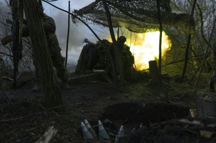 Ukrainian artillerymen of the Aidar battalion fire artillery towards Russian positions near Bakhmut