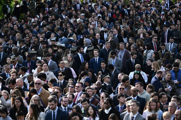 People gather on the South Lawn of the White House to see the arrival of South Korean President Yoon Suk Yeol and his wife Kim Keon Hee for a state visit