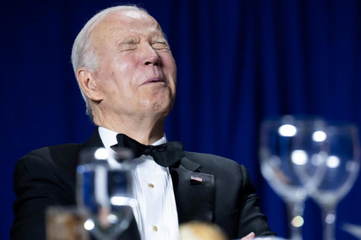 US President Joe Biden takes a joke during the White House Correspondents' Association dinner