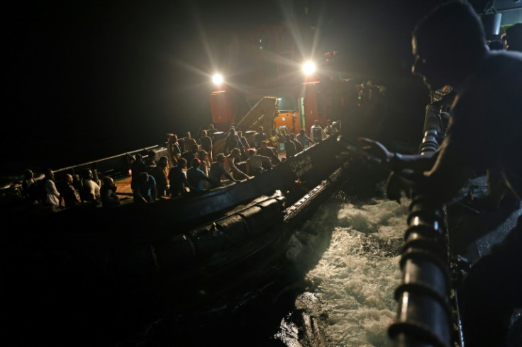 Before dawn, evacuees from Sudan's war boarded a tugboat which transported them out to a Saudi Arabian warship