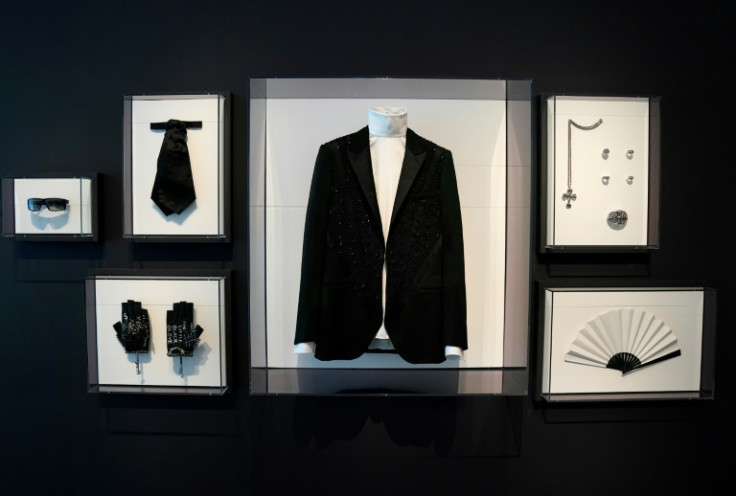 Karl Lagerfeld was known for his signature black suits, cravate, dark glasses and lots of jewelry