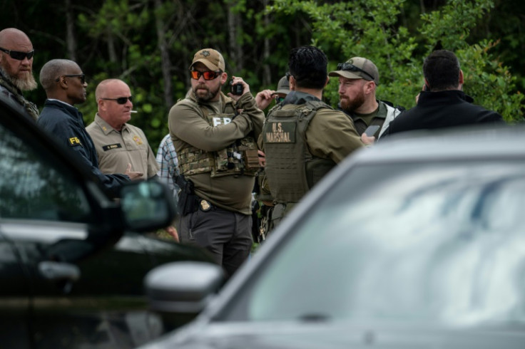 Law enforcement officers are searching for a man wanted for shooting dead five neighbors in Cleveland, Texas