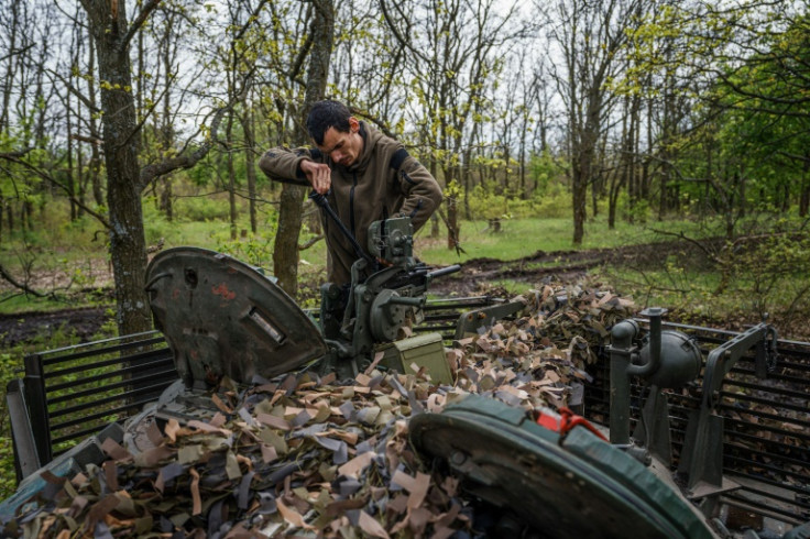 Ukrainian soldiers carry out regular maintenance on their equipment