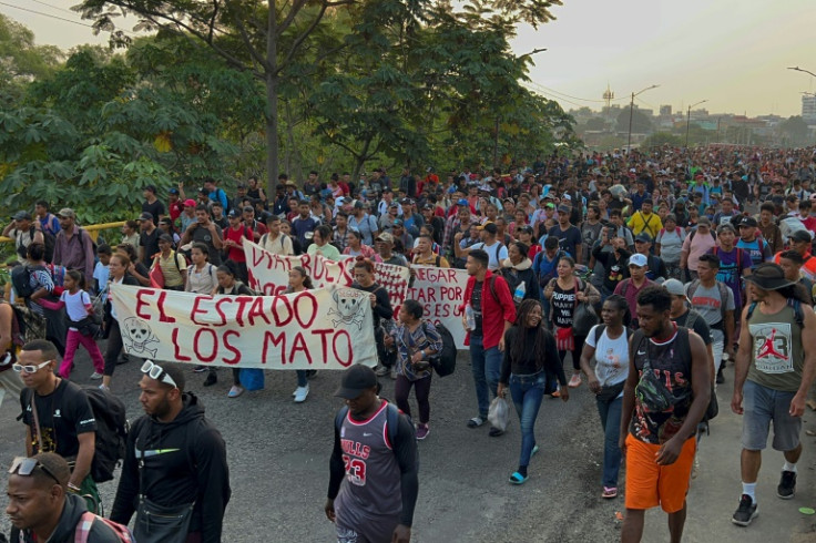 A caravan of migrants from Central and South America heading to the Mexico-US border in April, while protesting  the death of 40 migrants in a fire at a detention center in the northern city of Juarez