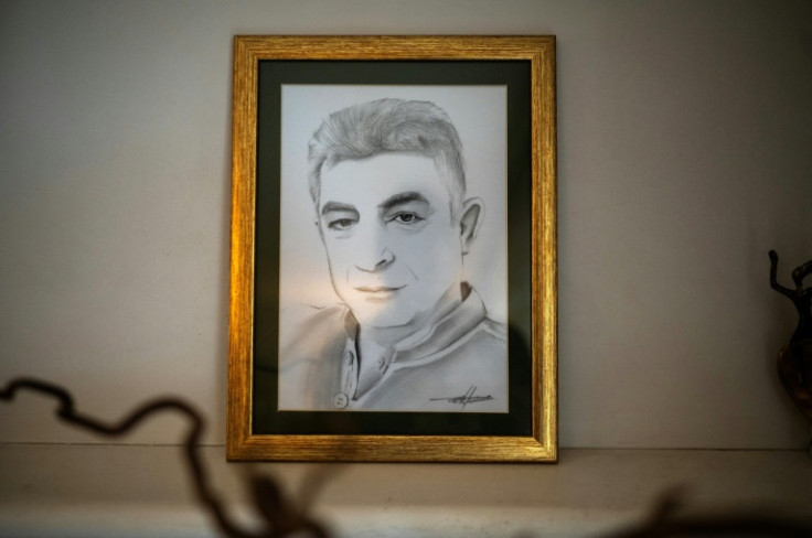 A sketch portraying Greek journalist Giorgos Karaivaz in the home outside which he was shot dead in 2021