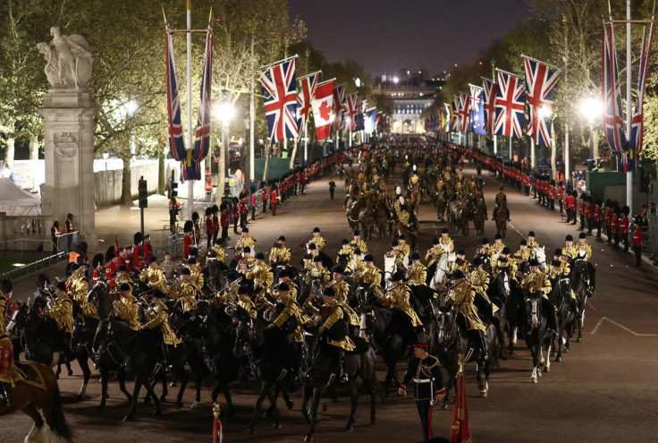 Members of the military take part in a full overnight dress rehearsal of the Coronation Ceremony of Britain’s King Charles and Camilla, Queen Consort in London