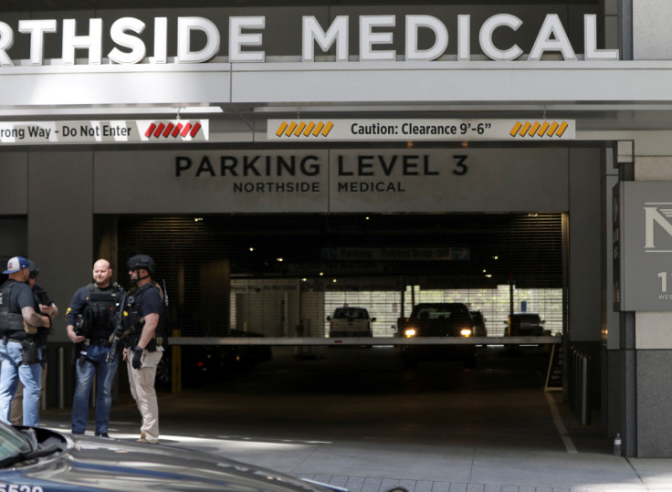 Law enforcement officers arrive after reports of several casualties from a gunman in a downtown hospital in Atlanta