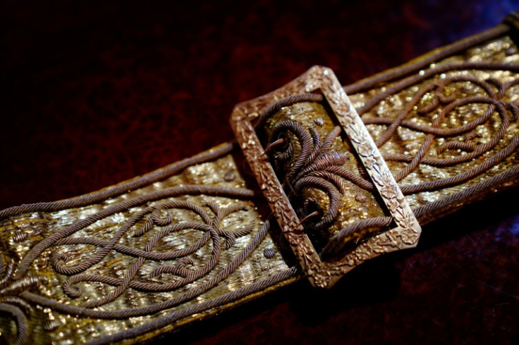 The coronation sword belt fastens the Supertunica