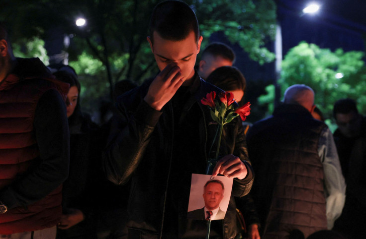 People gather to mourn victims of a school mass shooting, in Belgrade