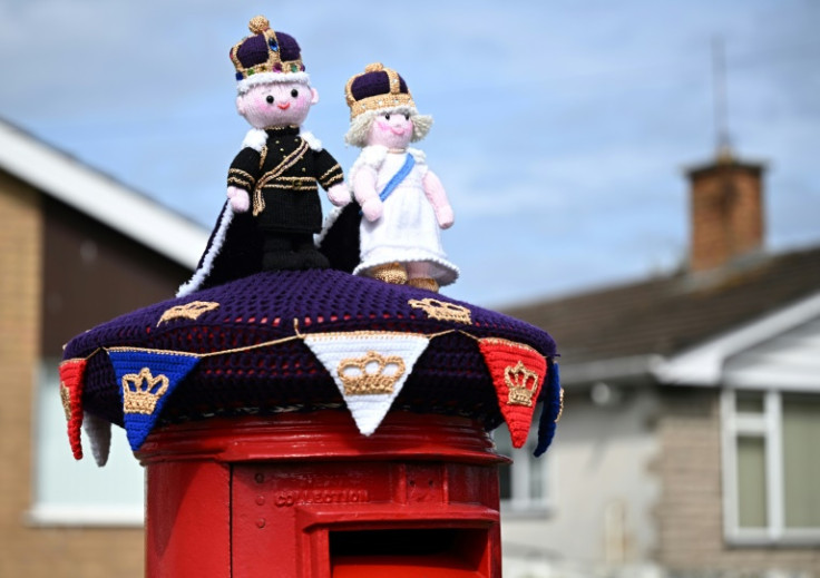 Knitted coronation decorations have been popping on Britain's distinctive red postboxes