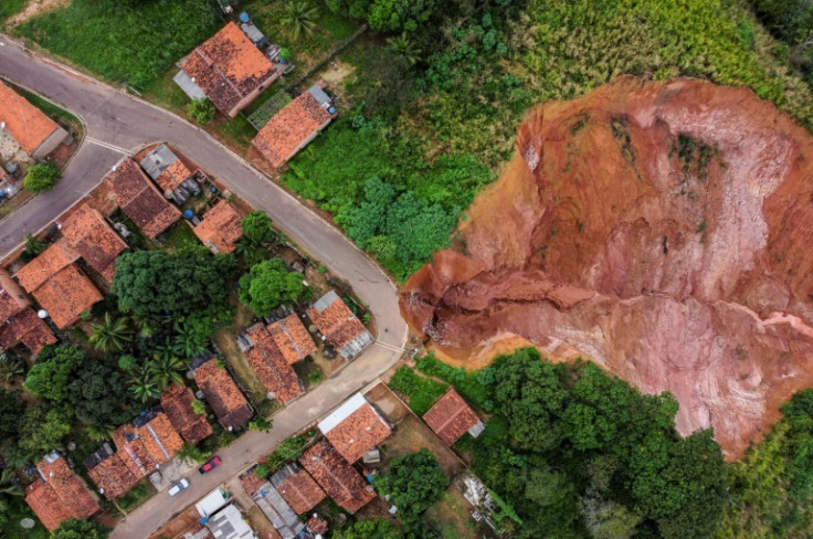 More than 300 houses are at risk of collapsing into the craters, according to the mayor's office