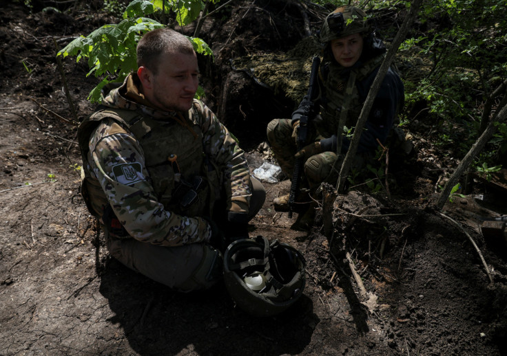 Ukrainian service members prepare rest at their positions at a front line near the city of Bakhmut