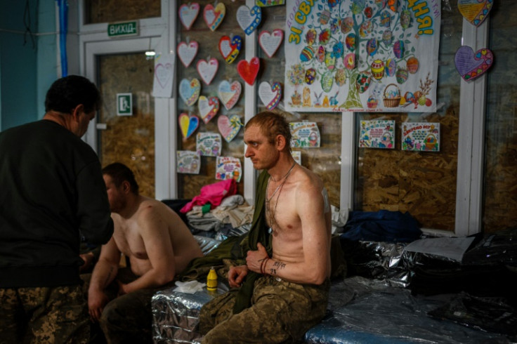 Some soldiers wounded early in the day only reach the first aid facility at night
