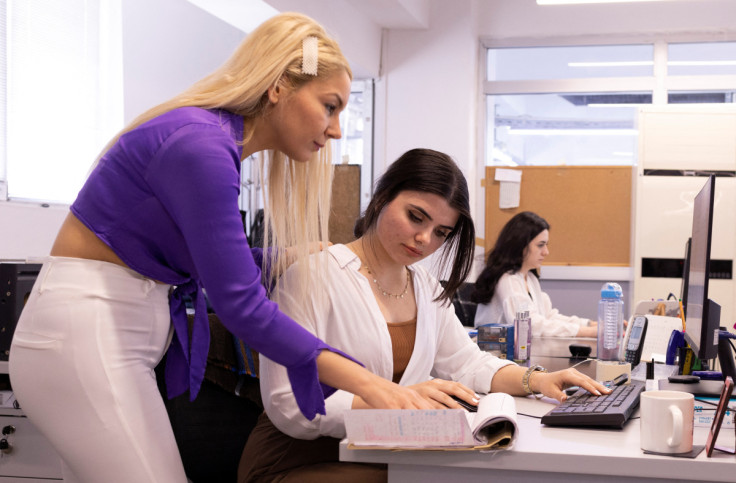 Berivan, who works at a textile company, and her colleague Ebru work in their office in Istanbul