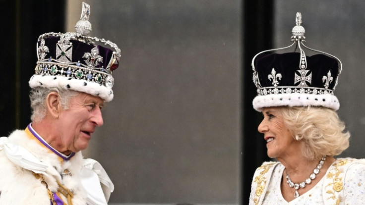 Charles and Camilla greeted crowds outside Buckingham Palace on Saturday