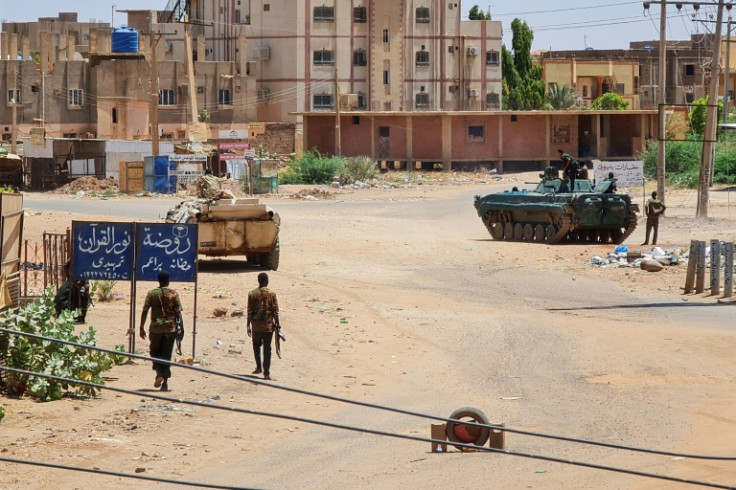 Sudanese Army soldiers and armoured vehicles in southern Khartoum, seen on May 6, 2023, amid ongoing fighting against the paramilitary Rapid Support Forces