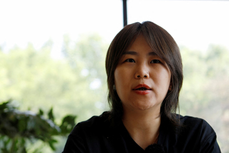Teresa Xu speaks during an interview in Beijing