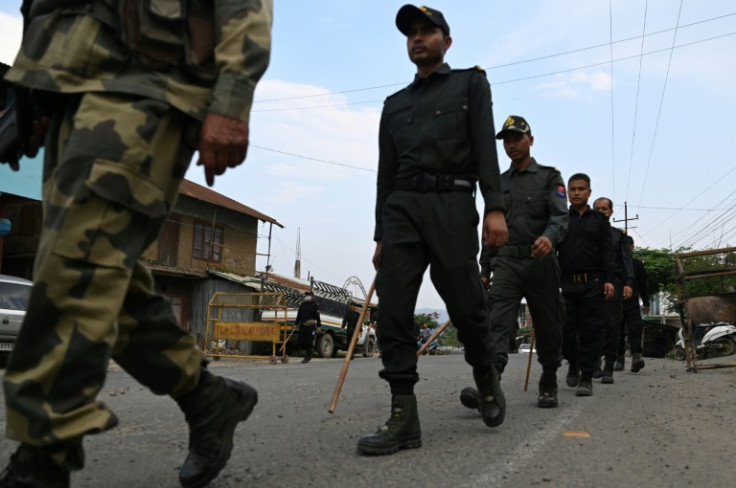 Indian Border Security Forces patrol the streets of Churachandpur in northeastern Manipur state after ethnic clashes between the mostly Hindu majority Meitei people and the mainly Christian Kuki tribe