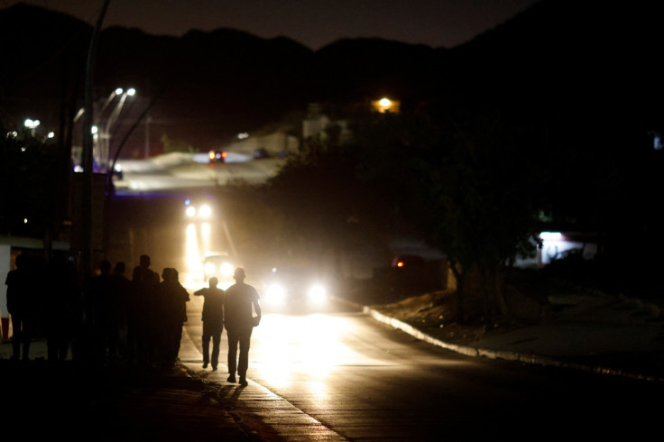 Migrants expelled from the United States to Mexico under Title 42 walk in Ciudad Juarez