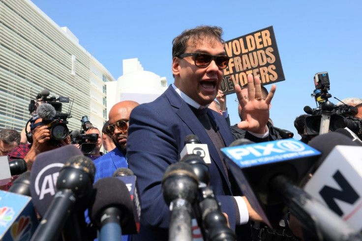 US Congressman George Santos speaks to reproters as he leaves Federal Court on May 10, 2023 in Central Islip, New York