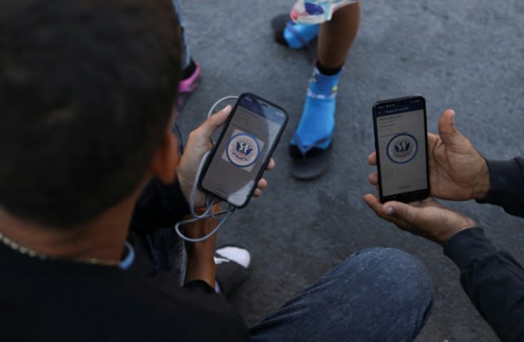 Venezuelan migrants use the CBP One mobile application created by the United States to try to make an asylum request appointment