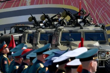 Military hardware rolls through Dvortsovaya Square during a Victory Day military parade in central Saint Petersburg on May 9, 2023