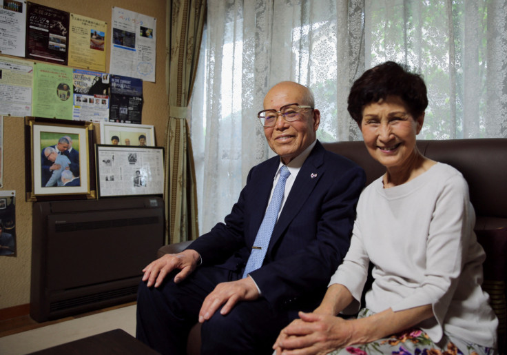 Atomic bomb survivor Shigeaki Mori and his wife Kayoko pose for a photograph during an interview with Reuters in Hiroshima