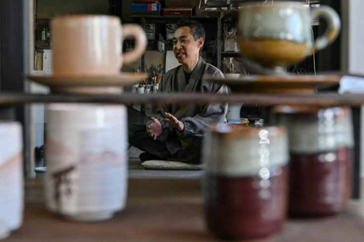 Third-generation potter Kosai Yamane uses ash from the burned cranes to glaze his ceramics