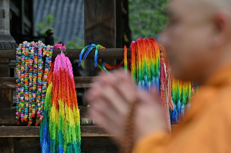 Monk Yoyu Mimatsu prays during a ceremony to burn thousands of paper cranes on the island of Miyajima, near Hiroshima