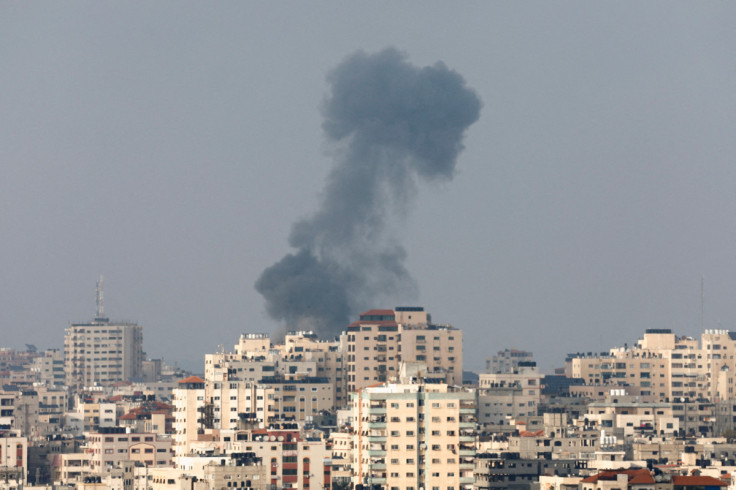 Smoke rises following an Israeli strike, in Gaza