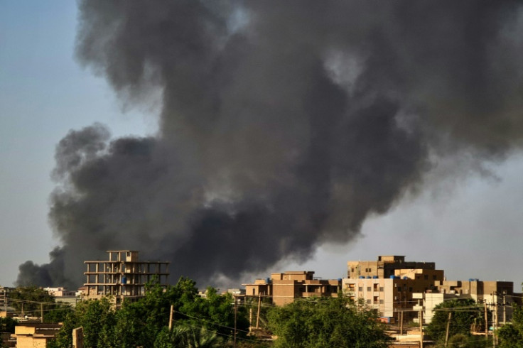 Smoke rises above buildings in Khartoum -- Sudan's war has continued unceasingly for more than a month