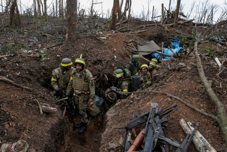 Ukrainian servicemen are seen after a fight near the front line city of Bakhmut