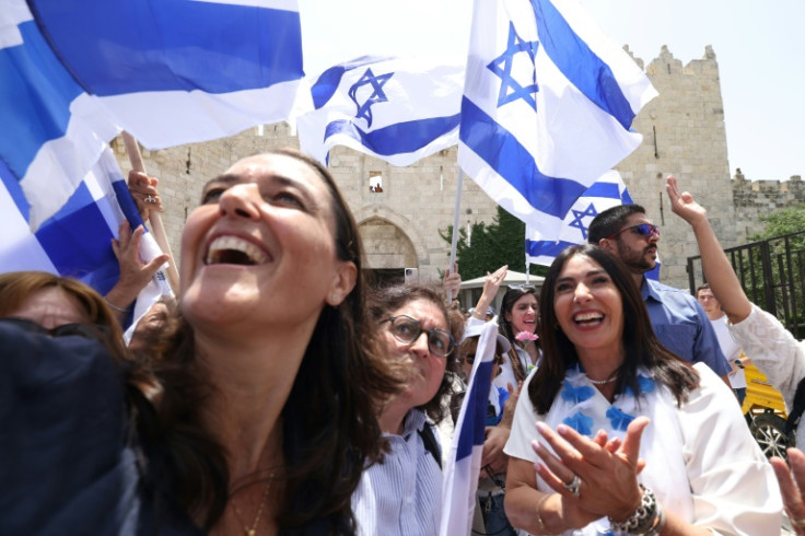 Transport Minister Miri Regev (R) was among Israelis waving flags at Damascus Gate in Jerusalem's Old City
