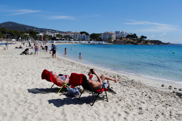 People enjoy the sunny weather on the Balearic island of Mallorca