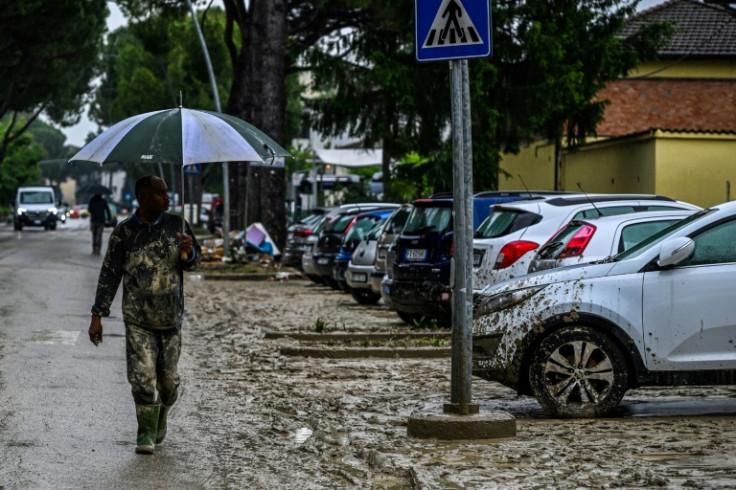 Many of Faenza's 60,000 residents have pulled together to try to restore some sense of order in their water-logged streets and homes