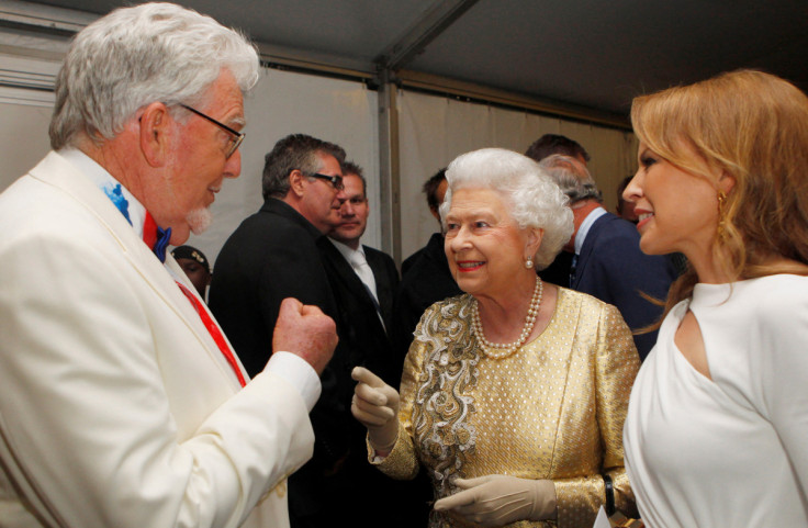 Queen Elizabeth meets Australian entertainers Rolf Harris and Kylie Minogue backstage at the Diamond Jubilee Concert outside Buckingham Palace in London