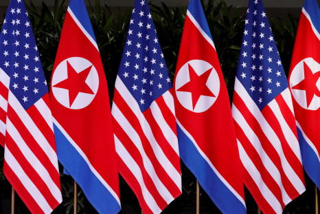 U.S. and North Korean national flags are seen at the Capella Hotel on Sentosa island in Singapore