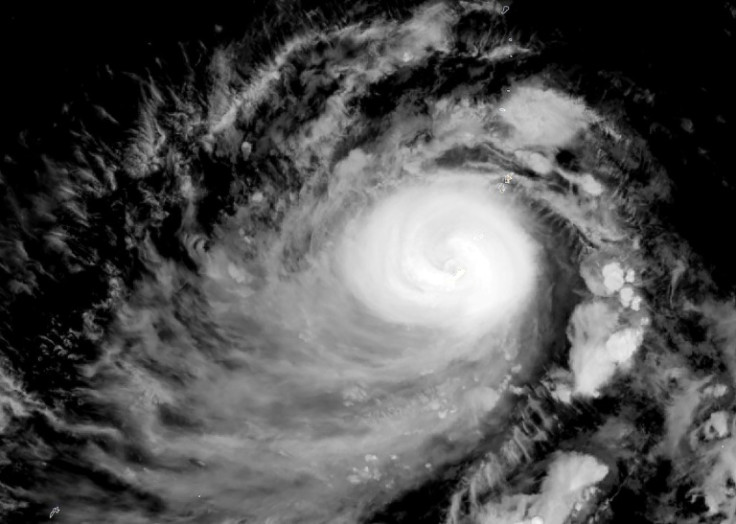 This satellite image shows Typhoon Mawar, over Guam on May 24, 2023, at 11:40 UTC -- Mawar roared over the US territory of Guam, bringing destructive winds to the Pacific military outpost