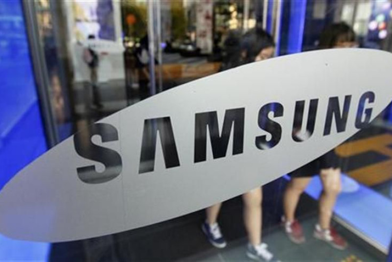 Students walk out of a showroom at the headquarters of Samsung Electronics in Seoul