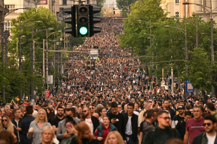 Thousands of protesters called for top officals to resign after two mass shootings left 18 people dead