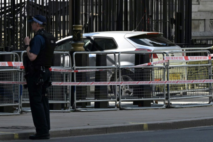 Armed police arrested one man after a car crashed into the gates of the UK prime minister's Downing Street residence