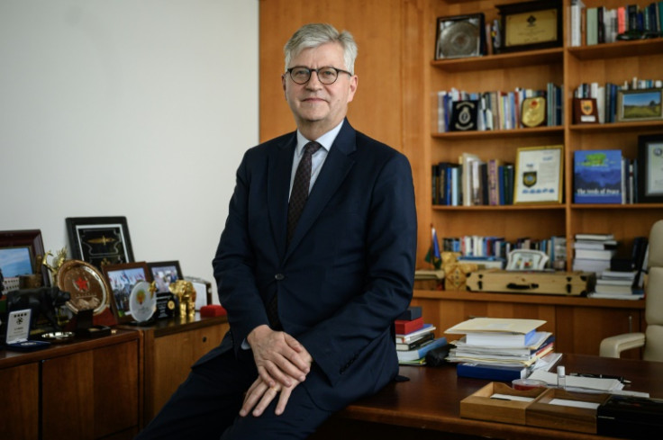 United Nations Under-Secretary-General for Peace Operations Jean-Pierre Lacroix poses for a photo in his office at the UN headquarters in New York City on May 23, 2023