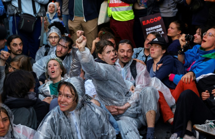 Scuffles between police and climate protesters outside TotalEnergies' AGM, May 2023