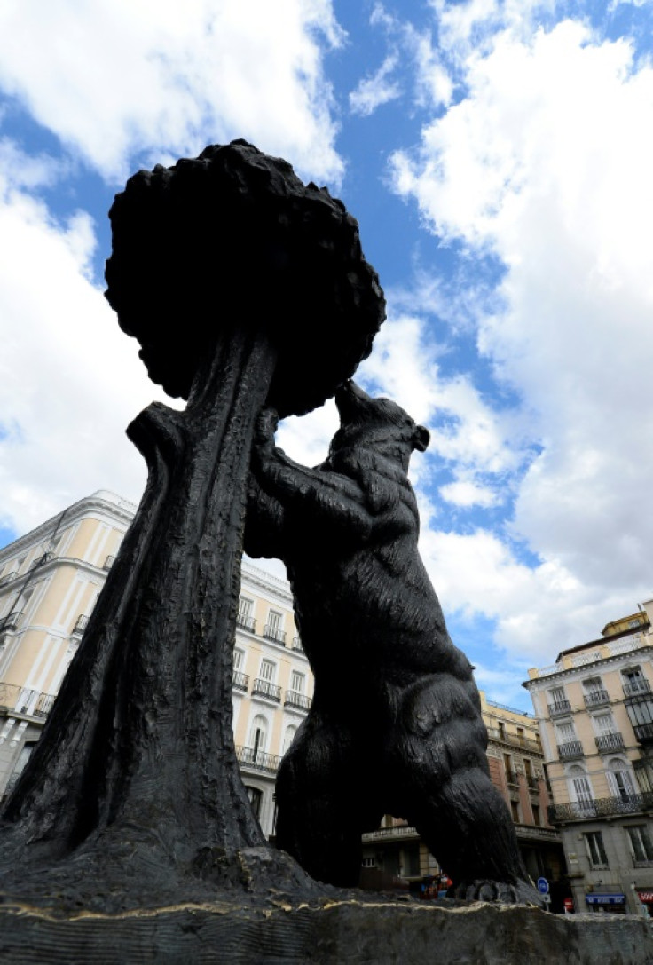 A statue of the bear and the strawberry tree, Madrid's official emblem, stands in Puerta del Sol square