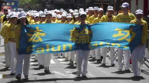 US accuses two of bribing IRS in anti-Falun Gong plot