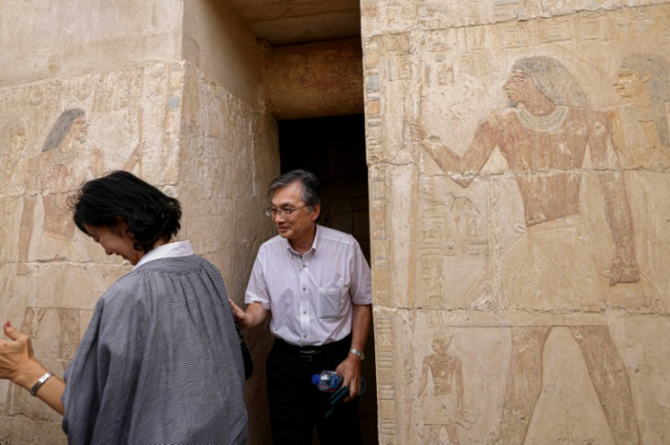 Japanese ambassador Oka Hiroshi visits a newly discovered tomb at the Saqqara archaeological site